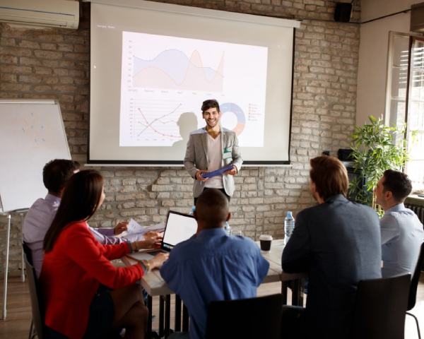 Speaker in communication with public in meeting room